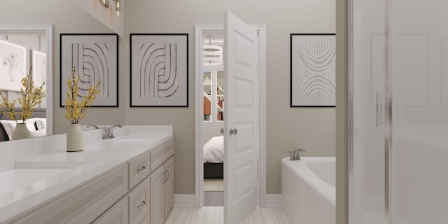 bathroom with vanity and a washtub