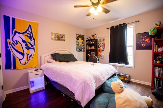 bedroom featuring ceiling fan and dark hardwood / wood-style flooring