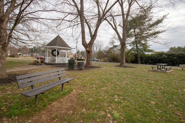 view of home's community with a yard and a gazebo