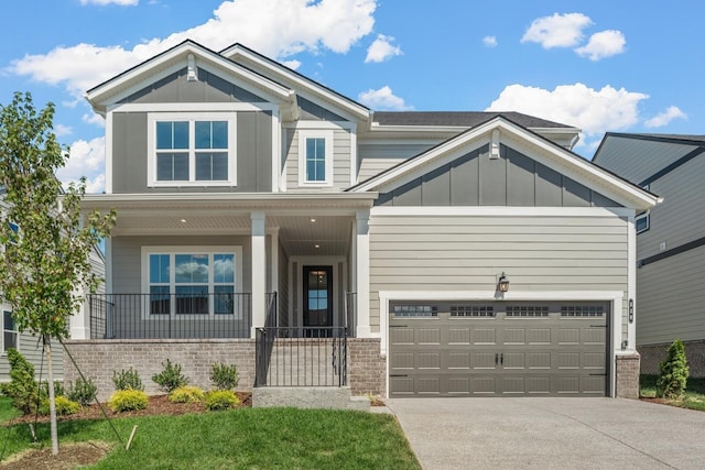 craftsman-style home with a porch and a garage