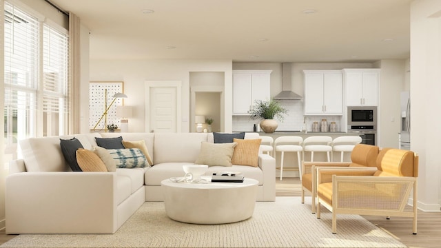 living room with light hardwood / wood-style flooring