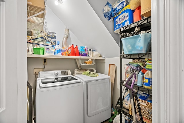 clothes washing area with washer and dryer