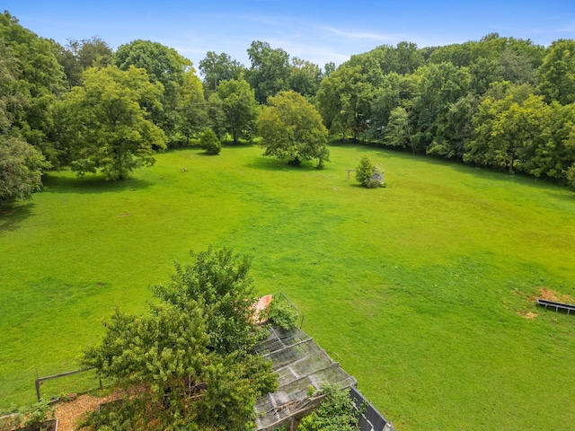 birds eye view of property featuring a rural view