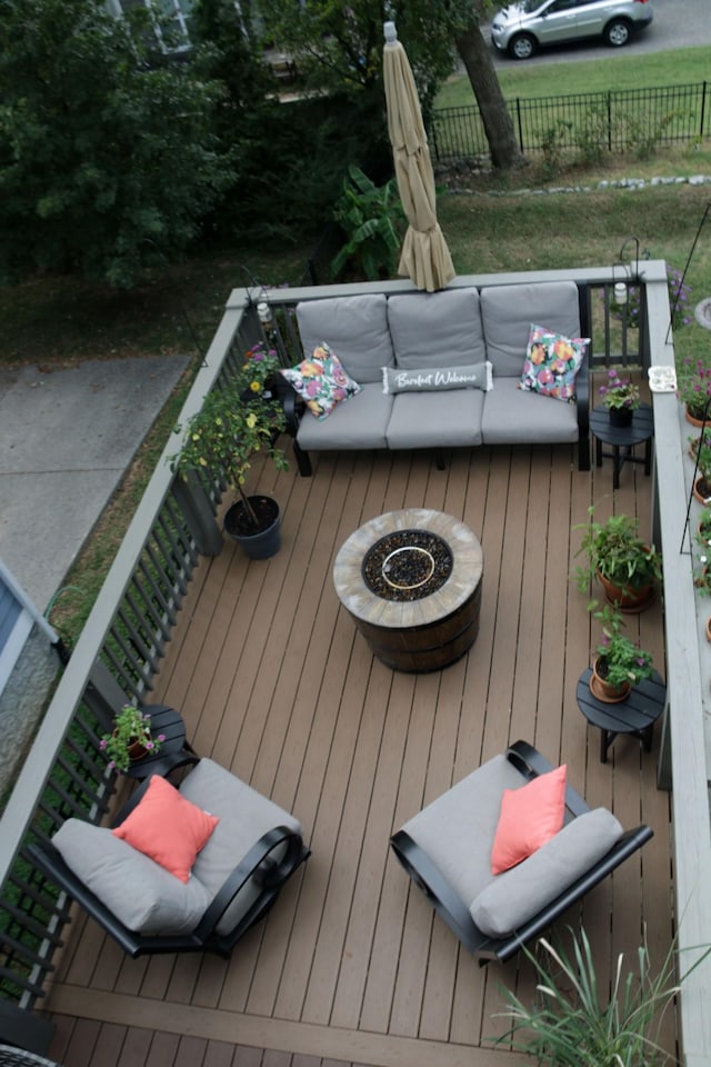 deck with a fire pit