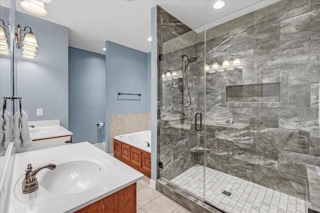 bathroom with tile patterned flooring, plus walk in shower, and vanity