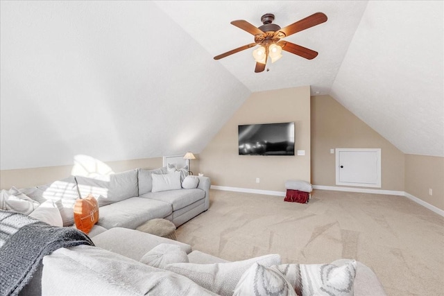 living room with ceiling fan, light colored carpet, and lofted ceiling