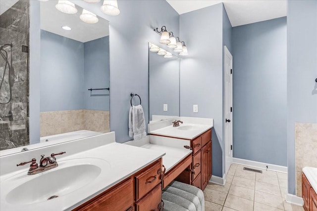 bathroom with vanity, plus walk in shower, and tile patterned flooring