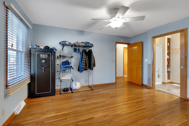 bedroom featuring ceiling fan and light wood-type flooring