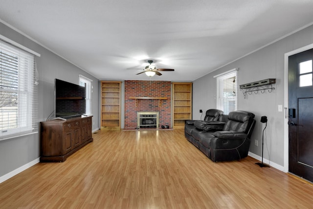 living room with plenty of natural light and light wood-type flooring