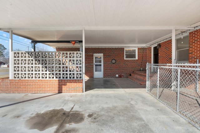 view of patio / terrace with a carport