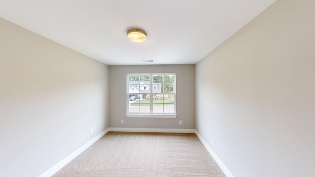 spare room with carpet flooring