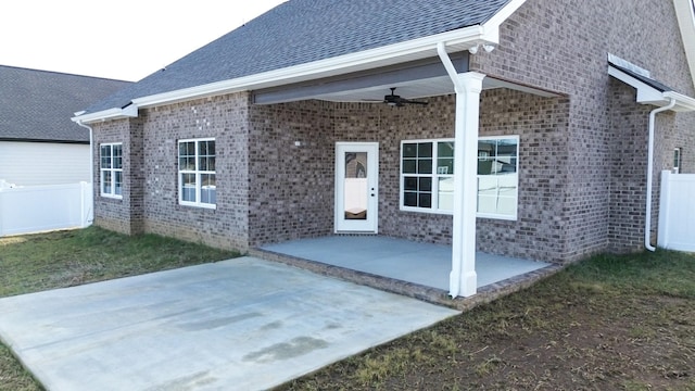 property entrance featuring ceiling fan and a patio