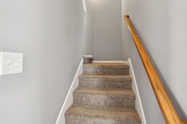 stairway featuring mail boxes