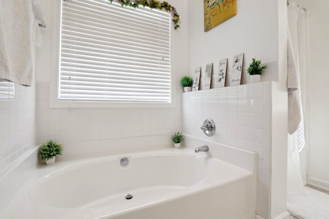 bathroom featuring a bath