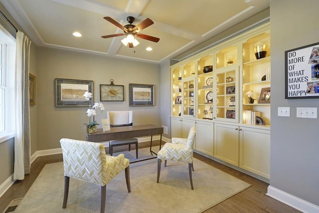 office featuring ceiling fan, coffered ceiling, and light hardwood / wood-style flooring