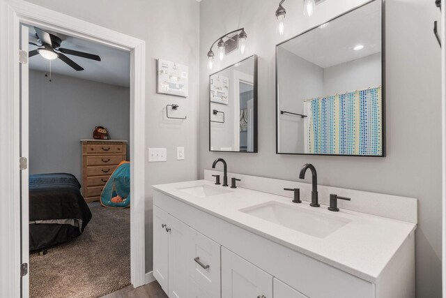 bathroom featuring vanity and ceiling fan