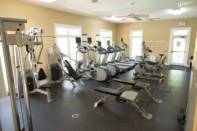 workout area featuring plenty of natural light and ceiling fan