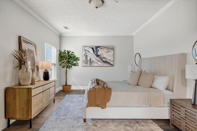 bedroom featuring crown molding, dark hardwood / wood-style flooring, and a textured ceiling