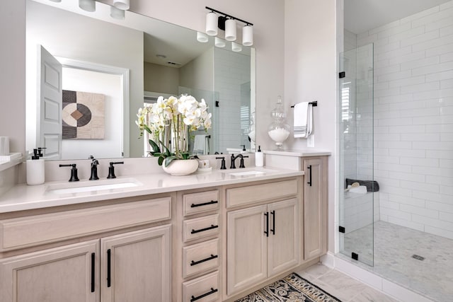 bathroom featuring walk in shower and vanity