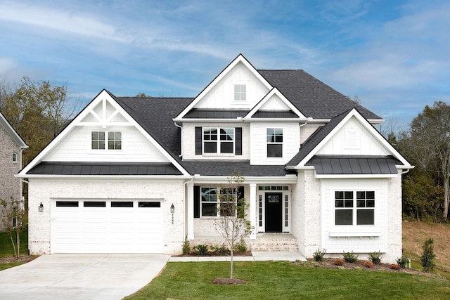 craftsman-style house with a garage and a front yard