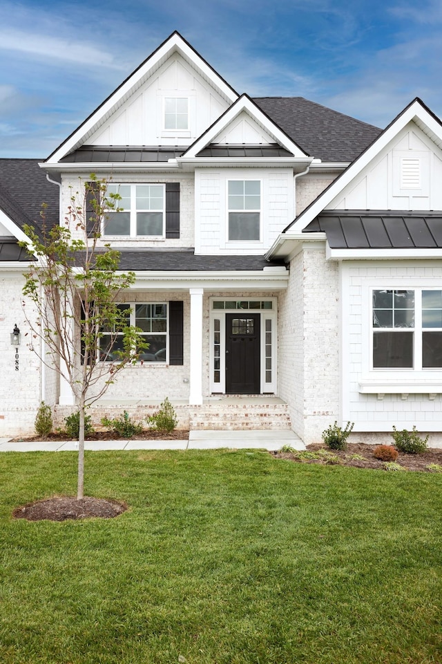 view of front of home with a front yard