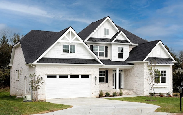 craftsman-style home with a garage and a front yard