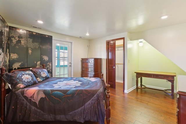 bedroom featuring wood-type flooring