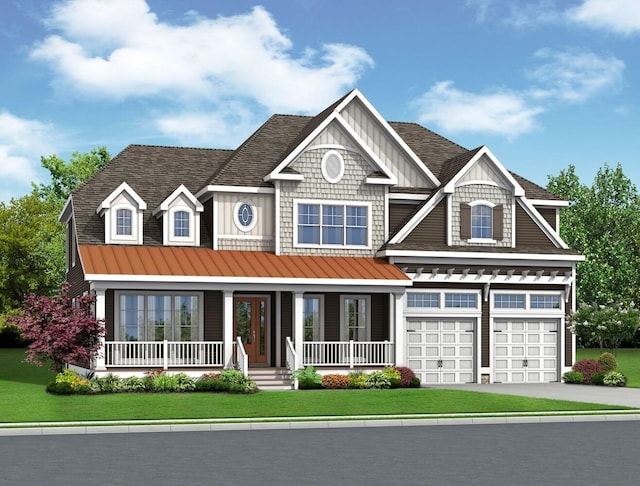 craftsman-style home featuring a garage, a front yard, and covered porch