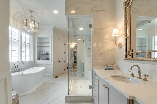 bathroom featuring vanity, independent shower and bath, built in features, and tile walls