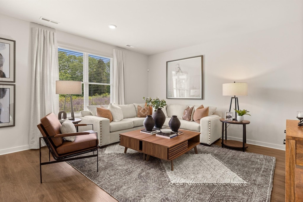 living room with dark wood-type flooring