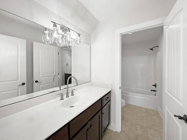 full bathroom featuring lofted ceiling, shower / bath combination, vanity, tile patterned floors, and toilet