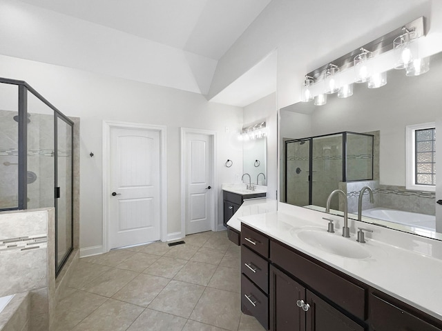 bathroom with vanity, tile patterned floors, and independent shower and bath