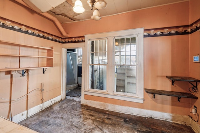 bathroom with a notable chandelier