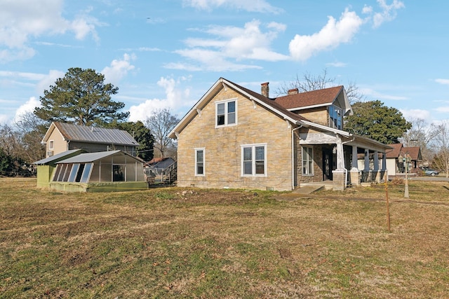 view of home's exterior with a yard