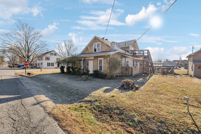 view of front of home with a front yard