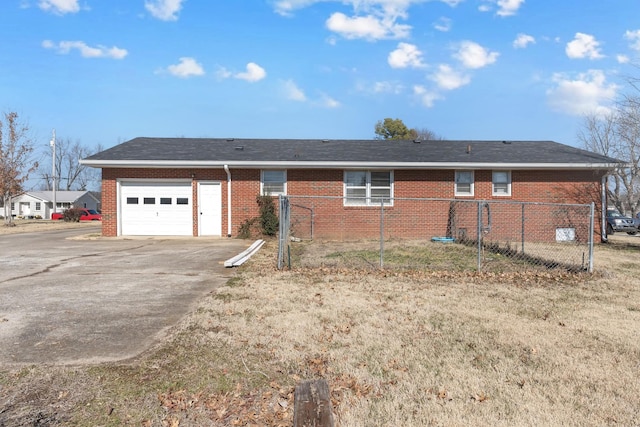 ranch-style home featuring a garage