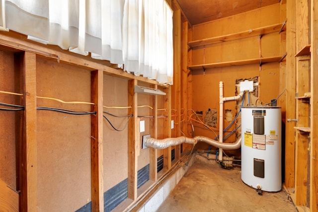 utility room featuring electric water heater