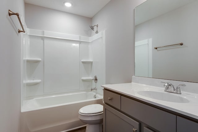 full bathroom featuring vanity, toilet, and tub / shower combination