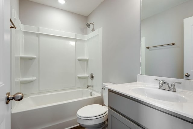 full bathroom with vanity, shower / washtub combination, and toilet