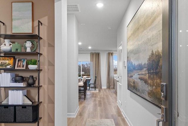 hall featuring light hardwood / wood-style floors