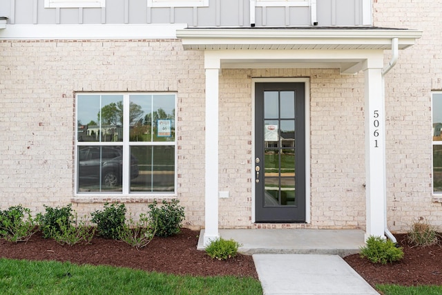 5061 Greentree Dr, Smyrna, TN 37167 - doorway to property featuring board and batten siding