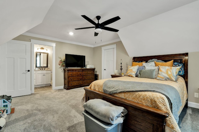 bedroom featuring crown molding, light colored carpet, ceiling fan, and ensuite bathroom