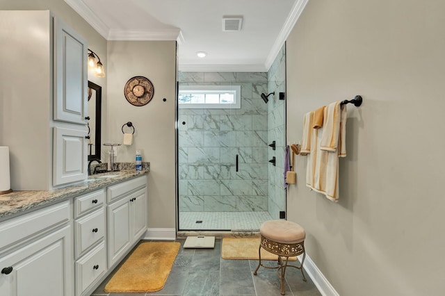 bathroom with crown molding, vanity, and walk in shower