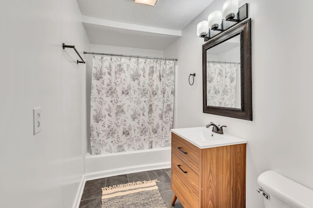 full bathroom with vanity, a textured ceiling, toilet, and shower / bath combo with shower curtain