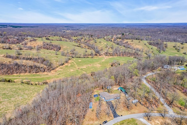 birds eye view of property featuring a rural view