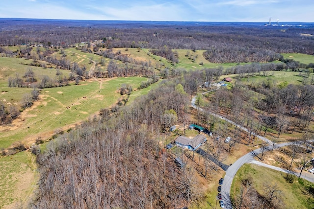 birds eye view of property with a rural view