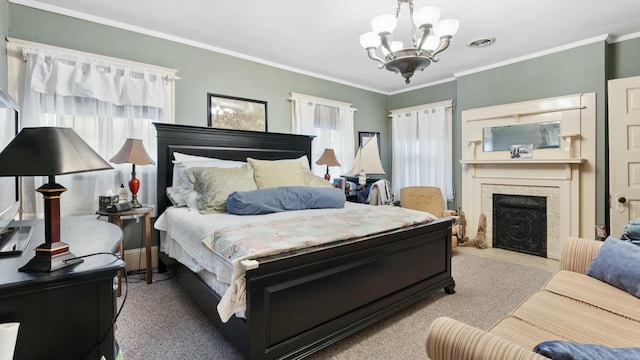 carpeted bedroom featuring multiple windows, crown molding, and a chandelier