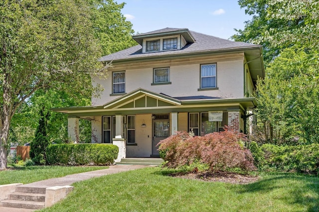 118 Morningside Dr, Chattanooga, TN 37404 - american foursquare style home featuring a porch, brick siding, and a front lawn