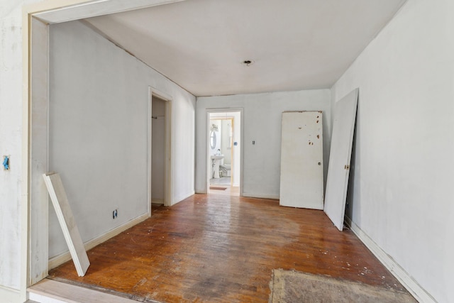 unfurnished room featuring wood-type flooring