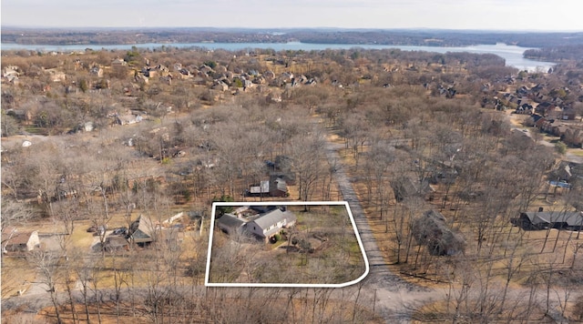 bird's eye view featuring a water view and a rural view